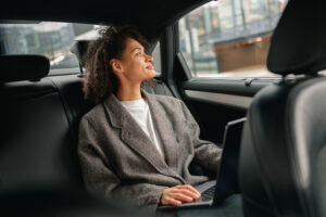 A woman works in the back of one of the top taxis East Peoria IL has to offer: MC Cabs