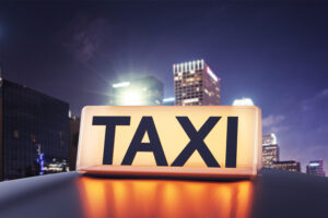 taxi cabs pekin il, Glowing taxi sign closeup in realistic style on a night city background symbolizing transport and urban mobility concept 3D Rendering
